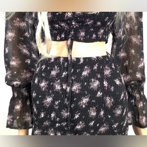 Skirt set-Black with designs( see photos ).  Size SMALL